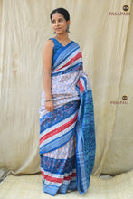 Load image into Gallery viewer, Close-up of Rudraksha motif border on Pushpaja Sambalpuri Bandha mercerized cotton saree in white and blue | Pasapali
