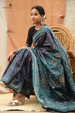 Load image into Gallery viewer, Pushpanjali bluish black Sambalpuri Bandha saree — folded view showing border and body, Pasapali
