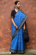 Rajani folded saree showing blue-black Sambalpuri Bandha weave structure and rudraksha border, Pasapali Odisha