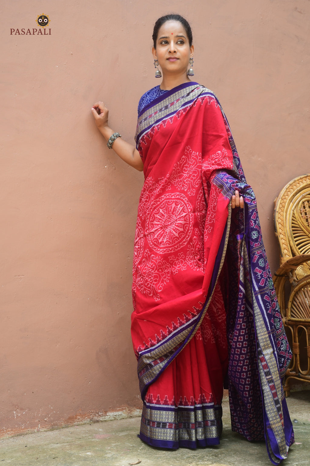 Ratnaprabha red Sambalpuri Bandha mercerized cotton saree by Pasapali — full hero view with chakra and phula jhoti body