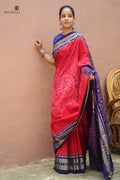 Ratnaprabha red Sambalpuri Bandha mercerized cotton saree by Pasapali — full hero view with chakra and phula jhoti body
