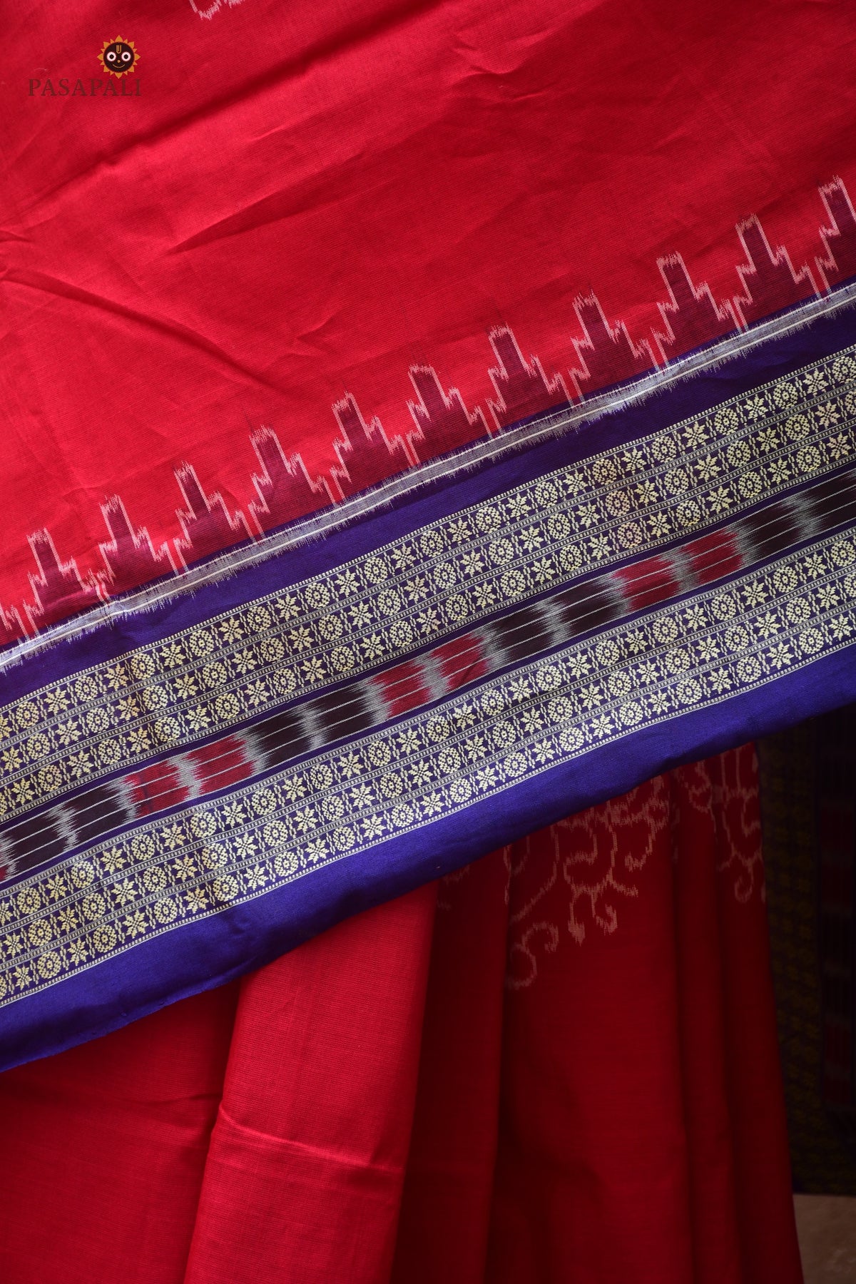 Ratnaprabha Sambalpuri cotton saree draped front view — blue secondary tones in chakra motif body, Pasapali Odisha