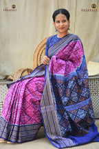 Rekha purple Sambalpuri handloom saree folded — blue pallu jhoti motif visible, Bandha ikat weave | Pasapali