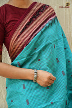 Full flat view of Sachipar Sambalpuri Bandha saree — Rama Green mercerized cotton with Sachipar check and fish buta by Pasapali