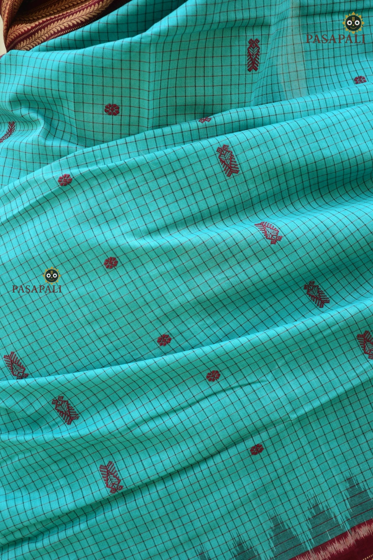 Maroon ikat border close-up on Sachipar Sambalpuri Bandha mercerized cotton saree by Pasapali — Bandhakala double ikat detail