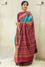 Front drape of Sachipar Rama Green Sambalpuri cotton saree showing fish buta body and chevron ikat border by Pasapali