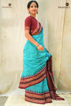 Pallu close-up of Sachipar Sambalpuri cotton saree — lotus and traditional floral double ikat in Rama Green and Maroon by Pasapali