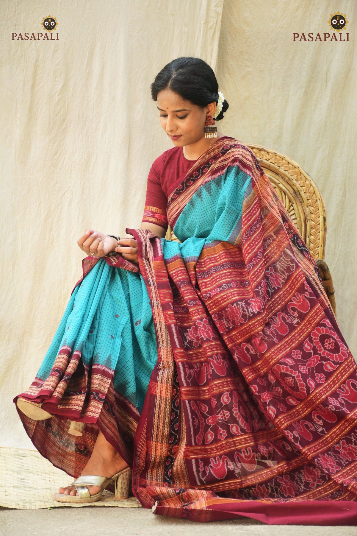 Handloom drape view of Sachipar Sambalpuri Bandha saree by Pasapali — Rama Green ground with lotus pallu and ikat border