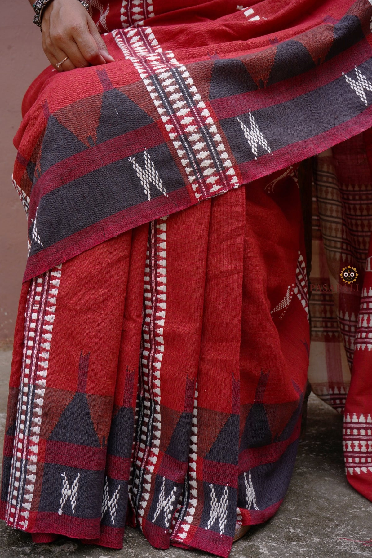 Sandhya Kotpad saree motif detail — macha fish pharsa axe extra-weft tribal motifs, Pasapali