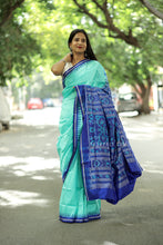 Load image into Gallery viewer, Sea Green Mulberry Silk Sambalpuri Saree with tiny butas and Royal Blue border – Pasapali.
