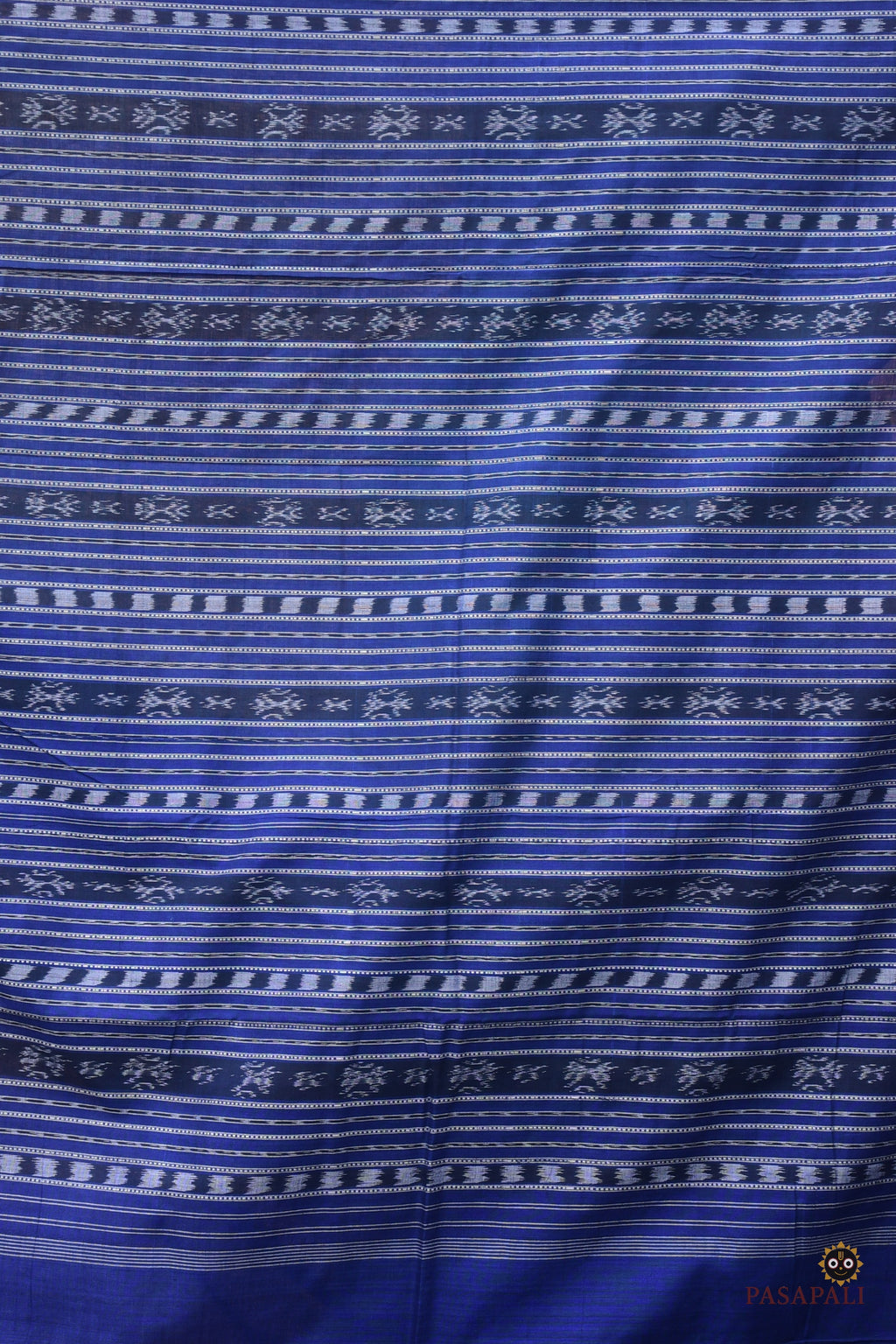Drape detail of Shailabala Sambalpuri cotton saree — ek phulia border movement and Phula pallu in pink and blue.