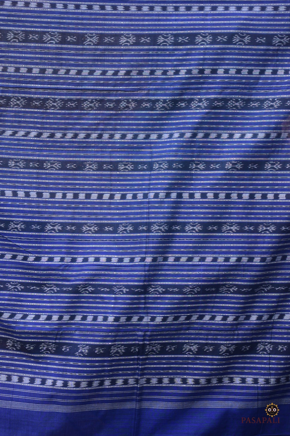 Drape detail of Shailabala Sambalpuri cotton saree — ek phulia border movement and Phula pallu in pink and blue.