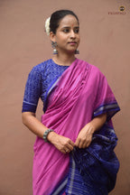 Front drape of Shailabala pink Sambalpuri cotton saree — solid pink body with blue kathiphera border. Pasapali.