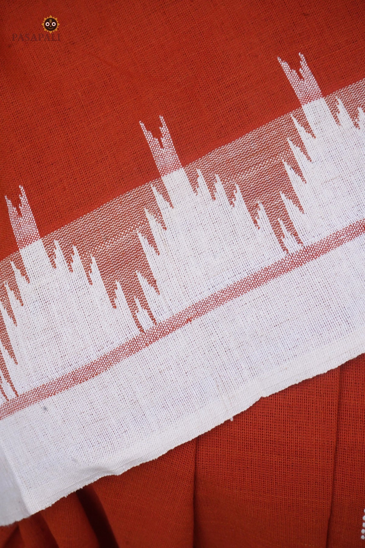 Shalmali Kotpad saree drape — off-white and orange handspun cotton, GI certified Kotpad textile