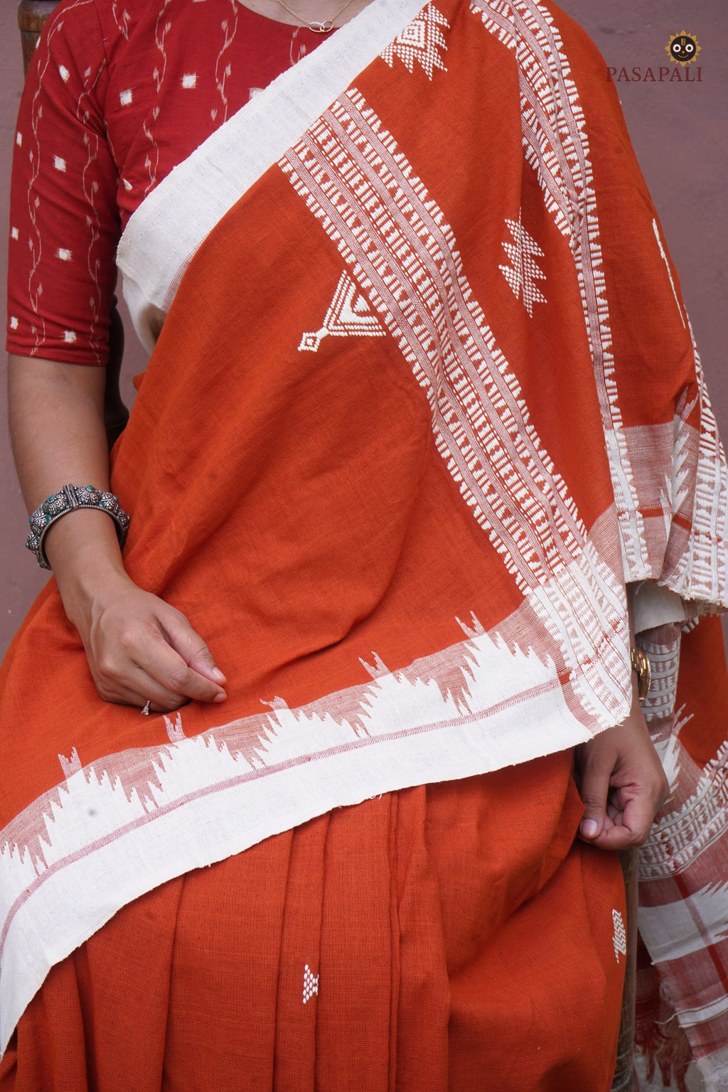 Border detail of Shalmali — kumbha temple motif, extra-weft interlocking, Kotpad handloom Odisha