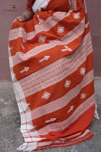 Shalmali pallu close-up — pharsa axe and macha fish woven in off-white on orange, Kotpad saree