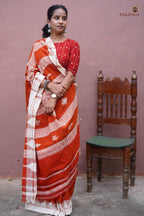 Shalmali Kotpad saree draped view — vegetable dyed orange cotton, tribal weave, Pasapali