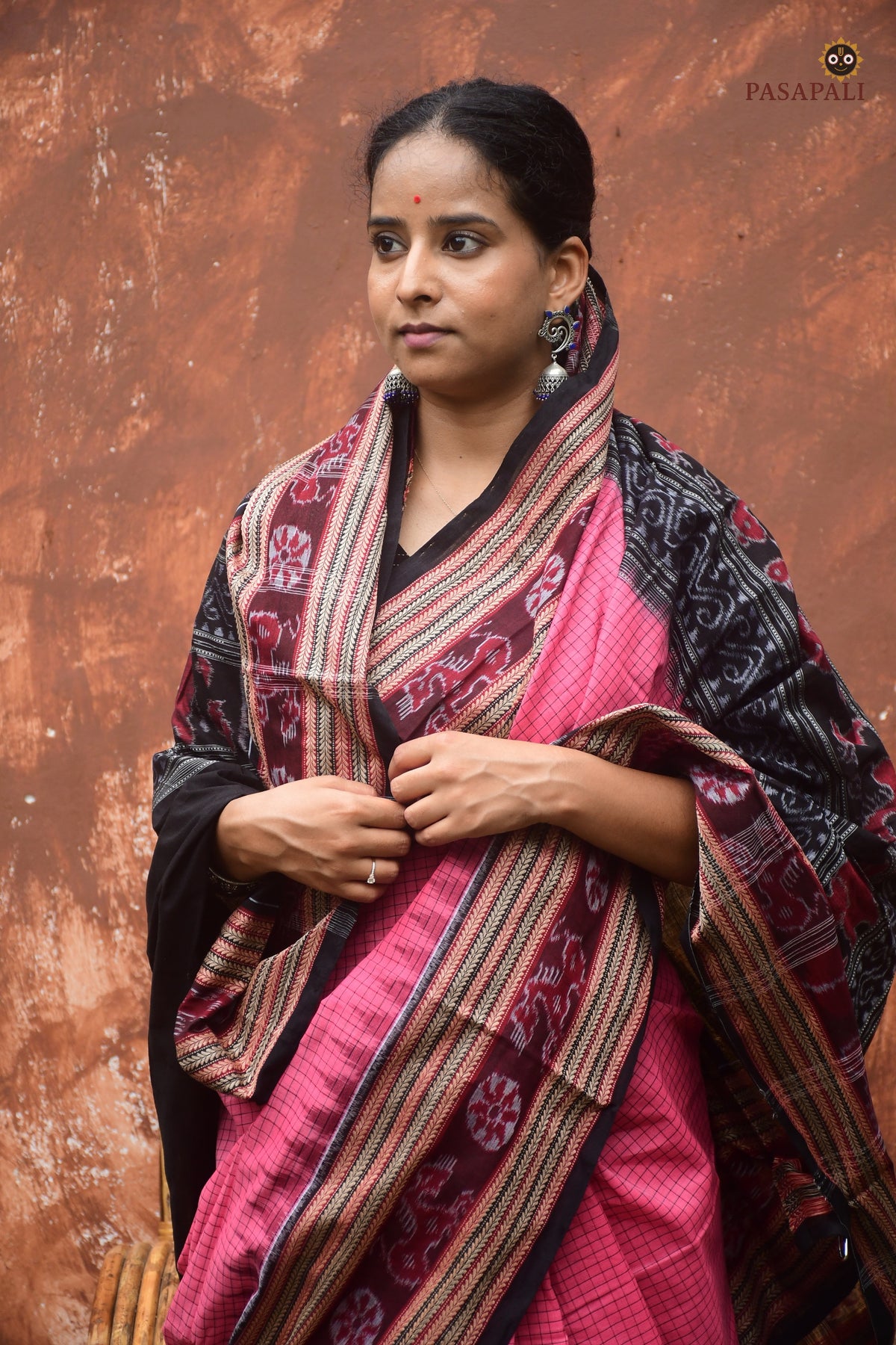 Flat lay of Sharada Pink Sambalpuri Bandha saree — full 5.40m length, blouse included, Pasapali handloom collection