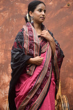 Sharada Pink Sambalpuri cotton saree draped front — double ikat Bandha weave, black chevron border, phula lata pallu