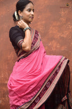 Close-up of black khajur chevron border on Sharada Sambalpuri Bandha saree — ikat motifs in between, Pasapali
