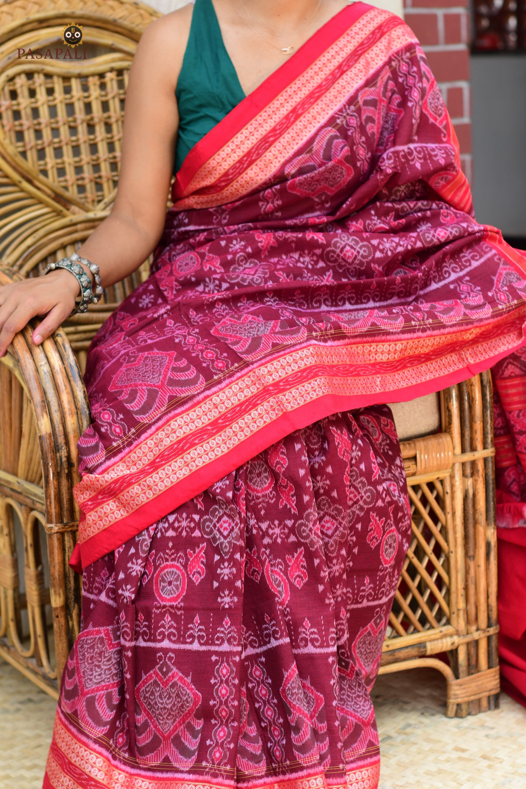 Shubhashree Sambalpuri cotton saree in maroon — complete overhead view of Bandha ikat weave with blouse, Pasapali