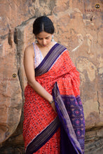 Load image into Gallery viewer, Shvetra orange Sambalpuri Bandha saree draped front view showing ikat body and blue border, Pasapali
