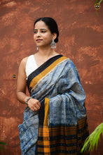 Load image into Gallery viewer, Smritirekha light blue Sambalpuri Bandha cotton saree full view — Pasapali, Bhulia handloom, golden black border
