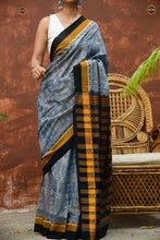 Load image into Gallery viewer, Smritirekha body weave detail — shankha and Lakshmi pada motifs in Bandha double ikat, GI certified Sambalpuri saree
