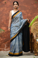 Load image into Gallery viewer, Smritirekha light blue Sambalpuri cotton saree folded — Lakshmi yantra motif visible, Pasapali handloom collection
