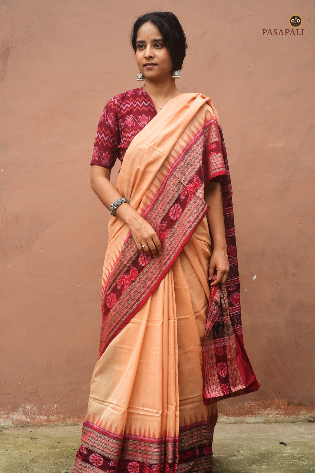 Full flat view of Sunanda — GI certified Sambalpuri handloom saree in light brown with traditional Bandha ikat motifs