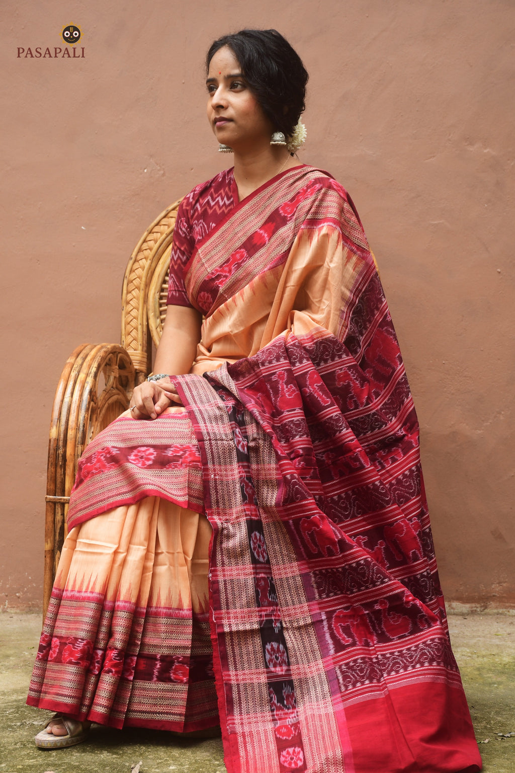 Chevron khajur border close-up on Sunanda Sambalpuri Bandha saree — double ikat motifs by Bhulia weavers Odisha