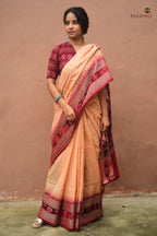 Handloom drape view of Sunanda — authentic Sambalpuri Bandha saree in mercerized cotton with chevron khajur border