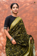 Load image into Gallery viewer, Flat lay of Suryalata Black Sambalpuri cotton saree showing full length — Rudraksha border, phula pallu, Pasapali
