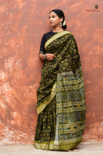 Load image into Gallery viewer, Folded view of Suryalata Black Sambalpuri cotton saree showing Bandha double ikat weave structure by Pasapali
