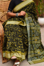 Load image into Gallery viewer, Drape view of Suryalata GI certified Sambalpuri handloom saree in black mercerized cotton with mehendi accents
