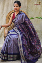 Load image into Gallery viewer, Sutrabandha flat lay — full length light blue Sambalpuri cotton saree with navy border, Pasapali

