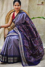 Load image into Gallery viewer, Sutrabandha border detail — navy blue fish motif on light blue Sambalpuri Bandha mercerized cotton saree
