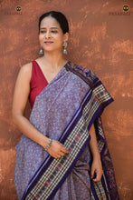 Load image into Gallery viewer, Sutrabandha draped front view — light blue mercerized cotton Sambalpuri Bandha saree with jala ikat body
