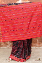 Load image into Gallery viewer, Tilottama Black Sambalpuri Bandha ikat saree flat lay — full 5.40 metre view, maroon red accents, Pasapali handloom Odisha
