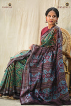 Vanalata green Sambalpuri cotton saree folded flat — Rudraksha border and Plula motif visible, Pasapali