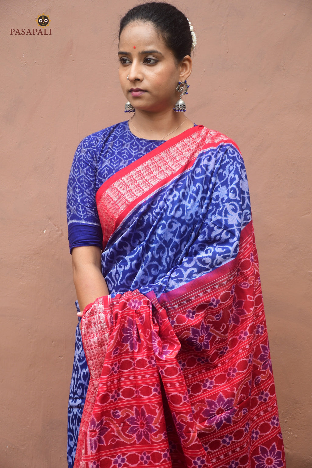 Yashodhara Blue Sambalpuri Bandha saree folded to show double ikat weave structure — Pasapali handloom